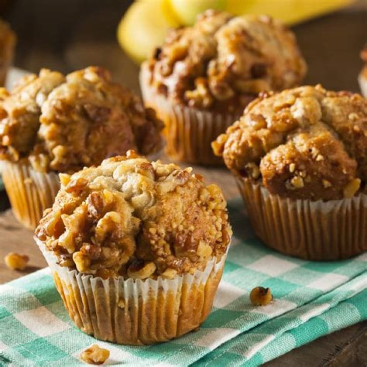 Banana nut muffins on a wire rack.