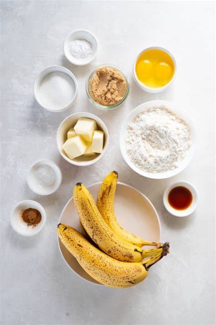 Easy Banana Bread ingredients: butter, sugar, flour, bananas, eggs baking soda.