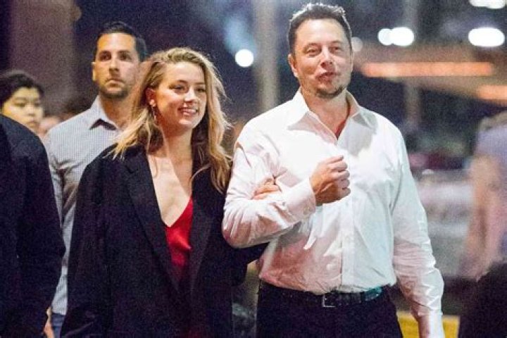 Elon Musk and Amber Heard's Relationship: Insights from Walter Isaacson's Biography - SarkariResult
