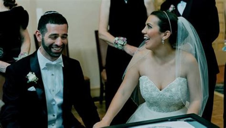 Image of Allysa Rose with her husband, Jose Rose and daughter